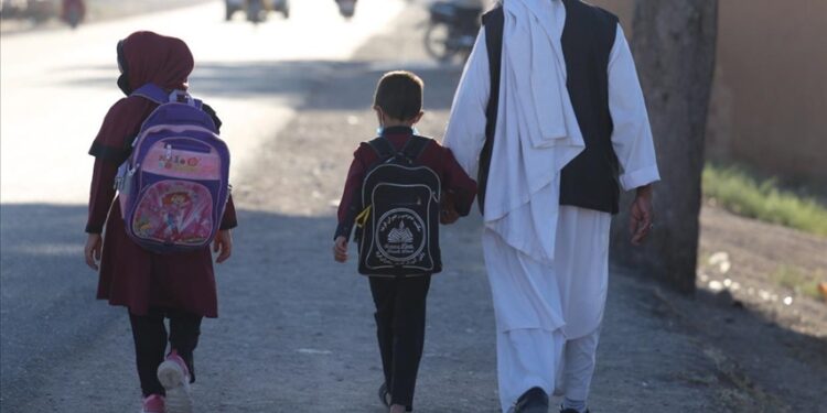 Afghan schools to reopen for boys, say Taliban
