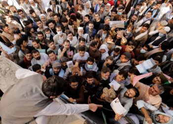 Crowd seeking travel documents gathers outside Passport office in Kabul