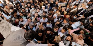 Crowd seeking travel documents gathers outside Passport office in Kabul