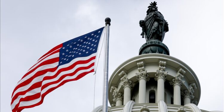 US Congress votes to avert government shutdown at midnight