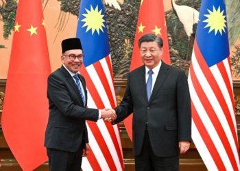 President Xi meets Malaysian PM