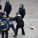 Protesters detained as Macron visits Amsterdam university: police