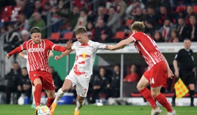 Outstanding Olmo steers ten-man Leipzig to German Cup final