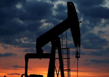 Oil slips on weak China data and rate hike expectations