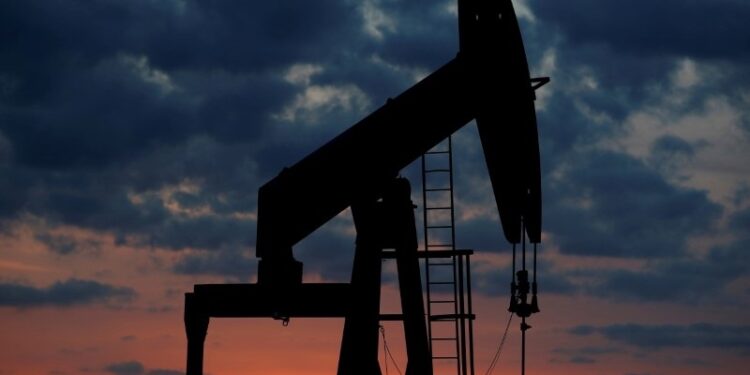 Oil slips on weak China data and rate hike expectations