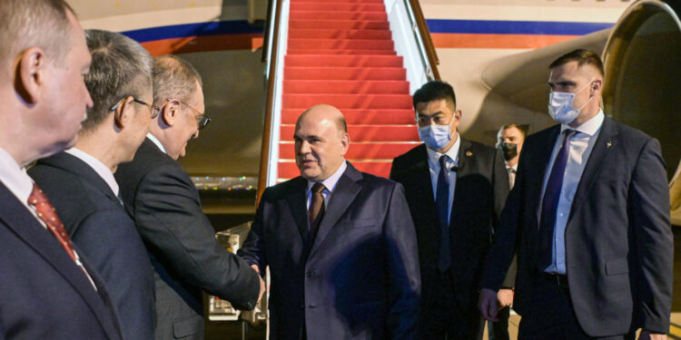 Russian PM in China for talks with Xi, business forum