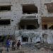 Gazans amid the rubble of homes flattened by fighting