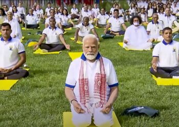 Protestors accuse Modi of using yoga to whitewash India’s crimes, as he leads yoga demo at UN
