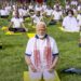 Protestors accuse Modi of using yoga to whitewash India’s crimes, as he leads yoga demo at UN