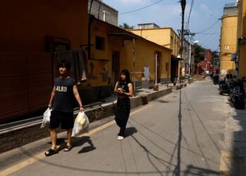 Chinese cities brace for floods as heat scorches inland regions