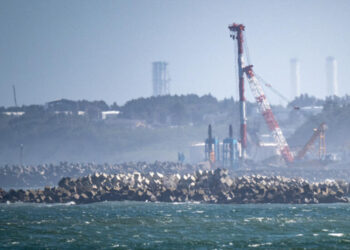 Fukushima operator says released water samples within safe limits