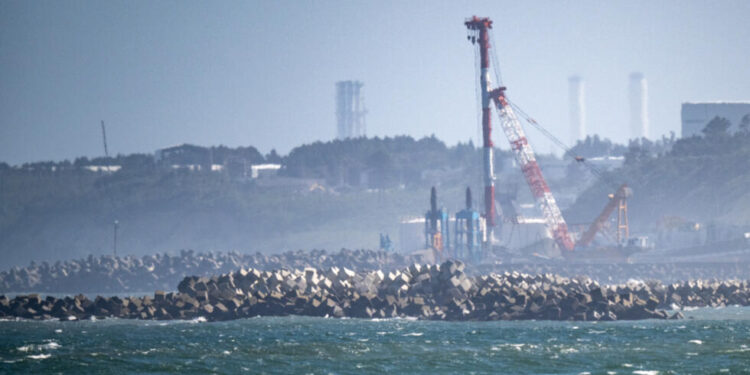 Fukushima operator says released water samples within safe limits