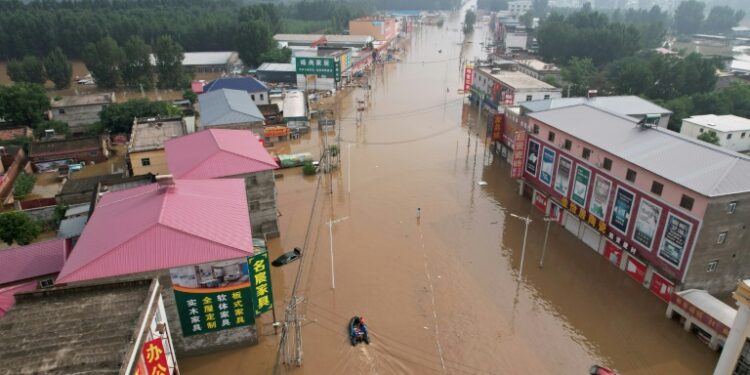 Streets become rivers as Beijing records heaviest rain in 140 years