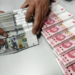 Chinese yuan strengthens to 7.1418 against USD Friday