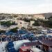 Italian island struggles as migrant surge doubles population