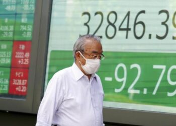 Japan stocks soar as yen hits 1-year low