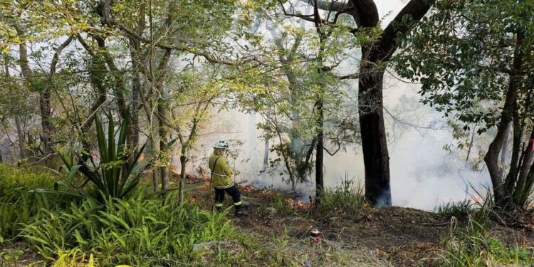 Residents in rural Australia evacuate homes as floods follow fires