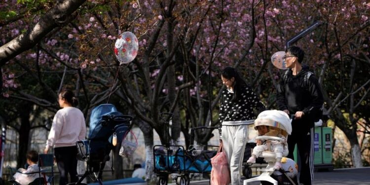 Births in China slide 10% to hit their lowest on record