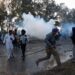 India security forces fire tear gas at protesting farmers on drive to Delhi