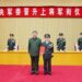 Xi presents order to promote military officer to rank of general