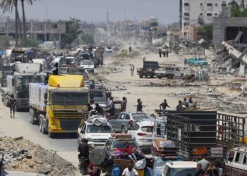 Multiple Israeli strikes kill dozens near UN aid hub in Gaza as thousands flee fighting