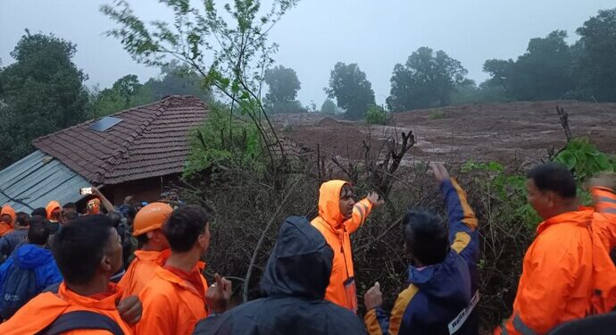 Landslides caused by heavy rains kill 49 and bury many others in southern India