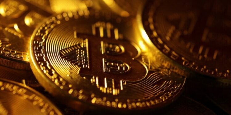 Bitcoin hits $100,000 for first time as traders cheer Trump pick