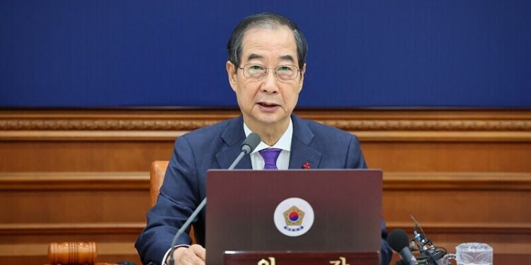 South Korea court reinstates impeached PM Han as acting president