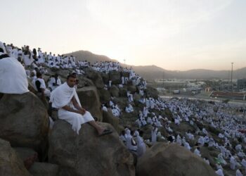 ‘Very blessed’: Muslim pilgrims pray at Mount Arafat in Haj apex